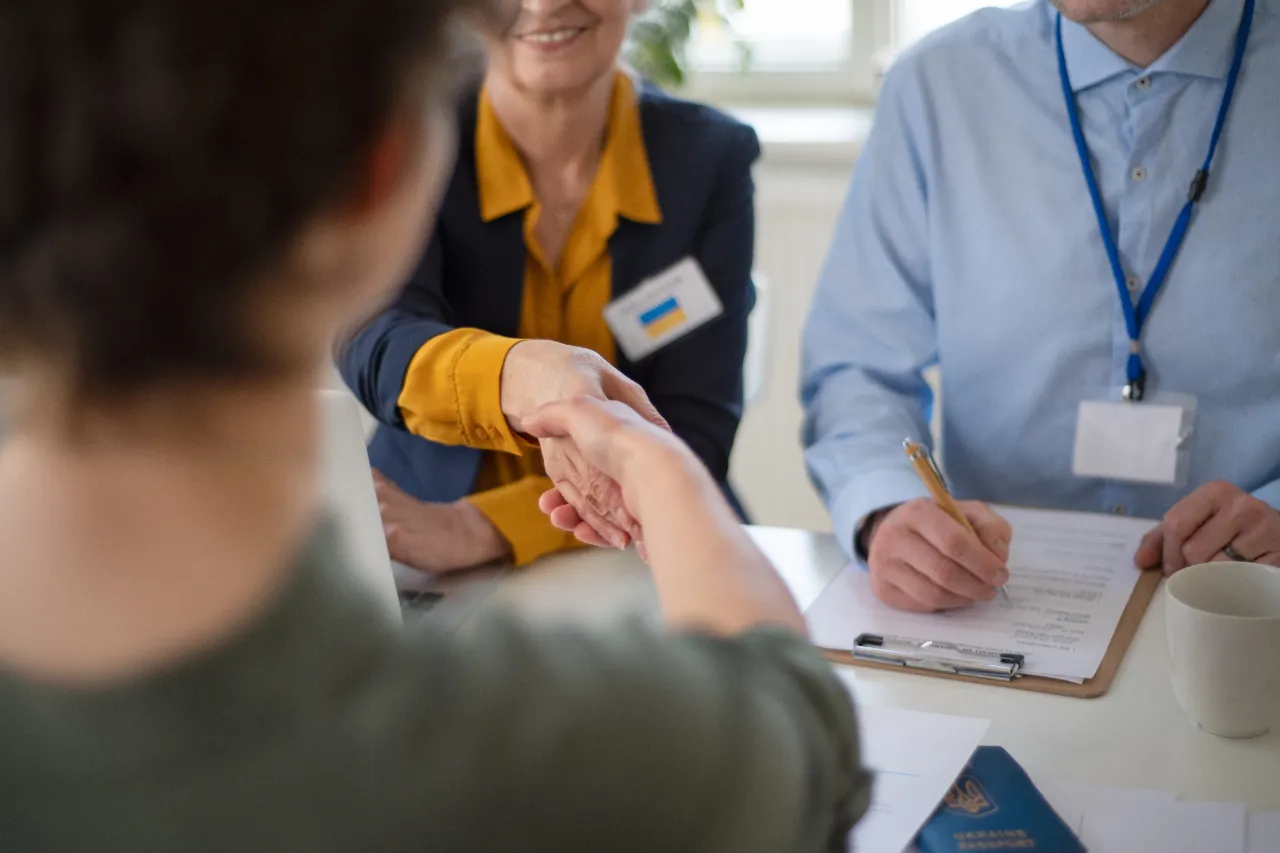 Money transfer assistance at the Danbury office counter